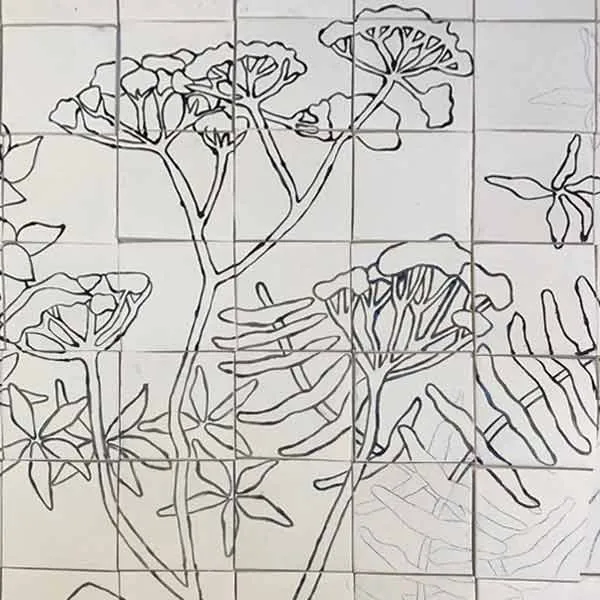 Tracé de la maquette d'une composition florale sur carreaux